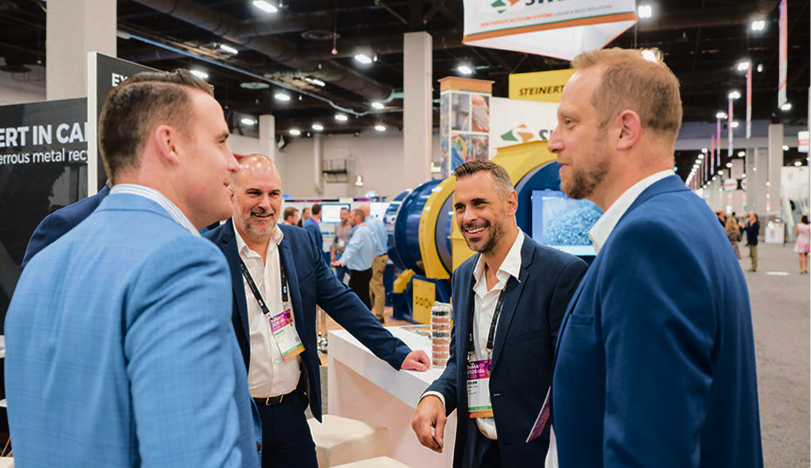 Attendees meet equipment and service partners on the show floor.
