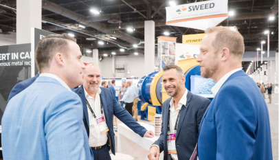 Attendees connecting on the expo floor.